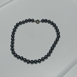 Dark gray, faux pearl necklace. 18” long.